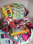 Pile of donated quilts